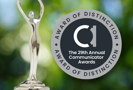 Award statue and badge for Award of Distinction for the 29th Annual Communicator Awards