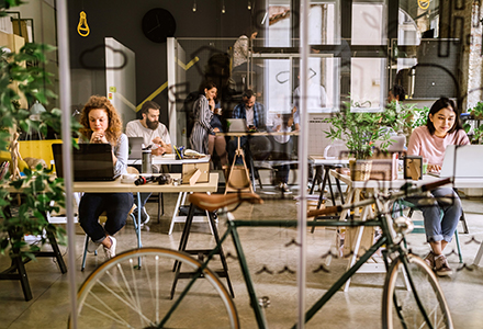 Photo of employees working in a modern office