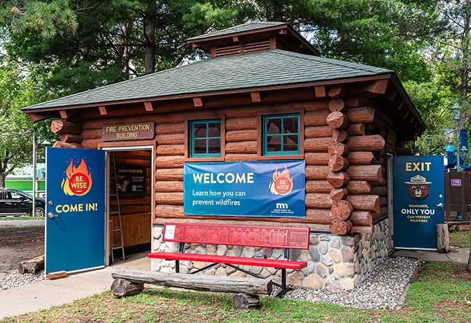 Exterior of the DNR Fire Prevention Building at the Minnesota State Fair with banners and graphic panels on the doors