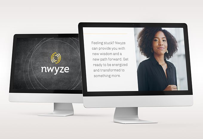 Two Nwyze PowerPoint screens on monitors