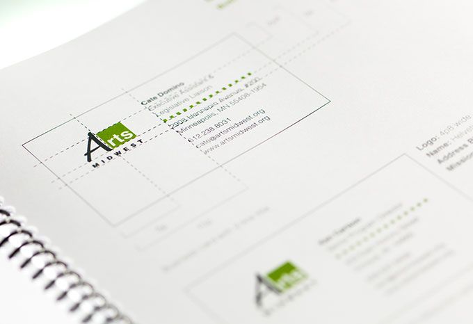 Detail of a brand guidelines document detailing business card specifications