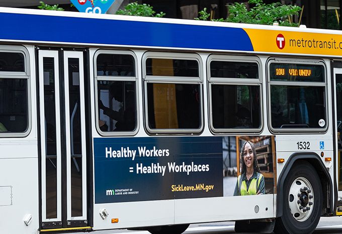 Exterior bus panel for the Minnesota Department of Labor Earned Sick and Safe Time Campaign