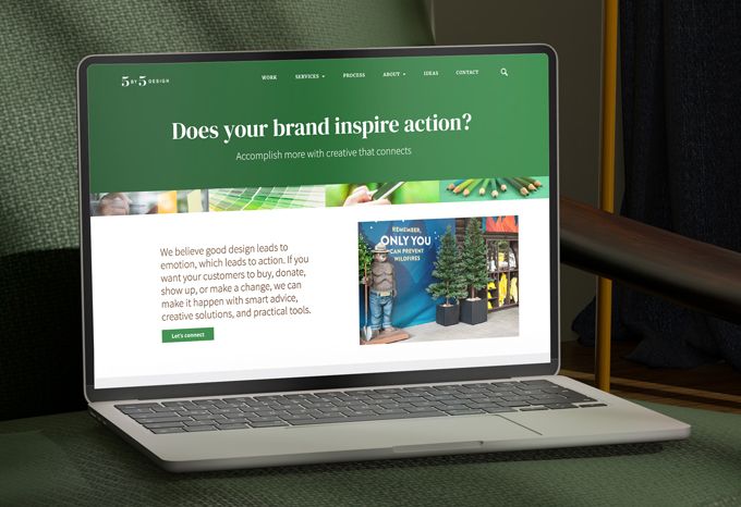 Laptop with 5 by 5 Design website