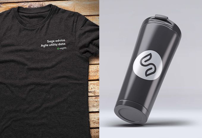 T-shirt with Sagiliti's tagline and logo and a black mug with Sagiliti's symbol