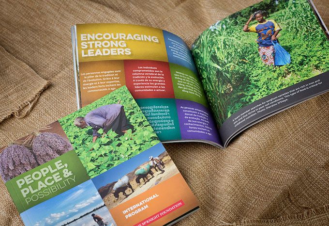 Cover and spread of a book about McKnight Foundation's International Program