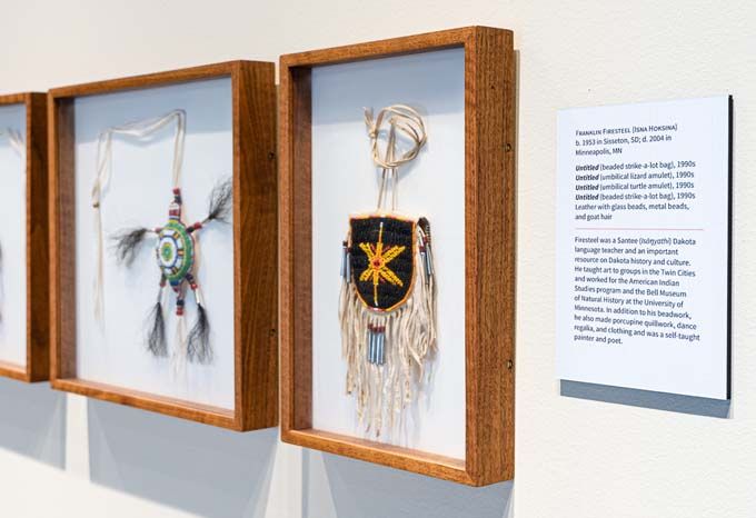 Label and art pieces in gallery in McKnight Foundation