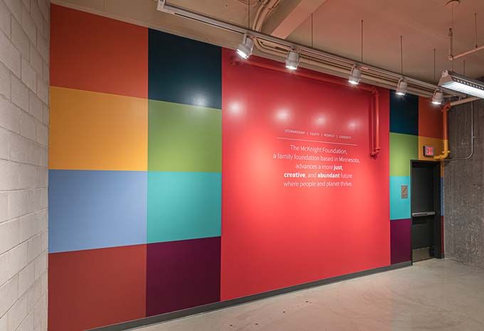 Painted wall with mission statement in lobby of McKnight Foundation