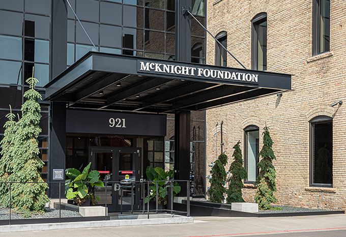 Exterior entryway sign during the day for McKnight Foundation