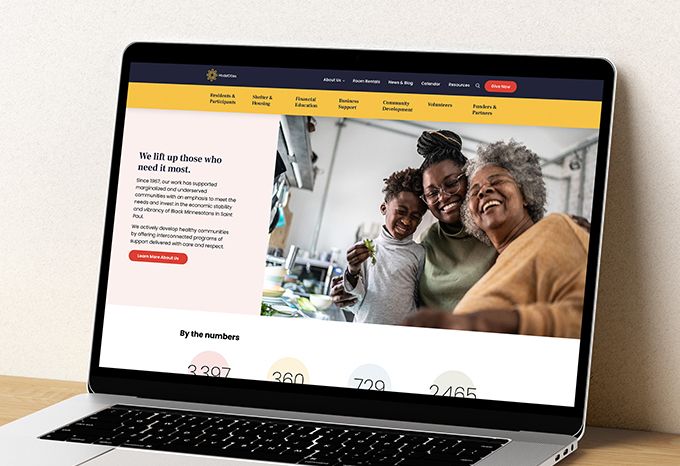 Laptop open to Model Cities' mission